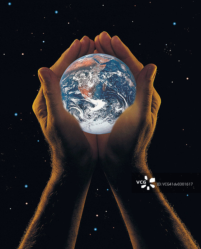 手捧地球，星空背景图片素材