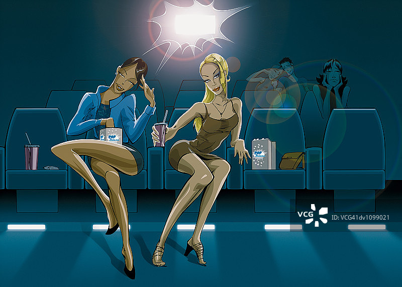 时尚女性在电影院看电影图片素材