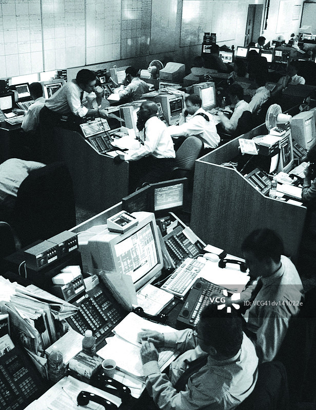 股票经纪人在证券交易所工作图片素材