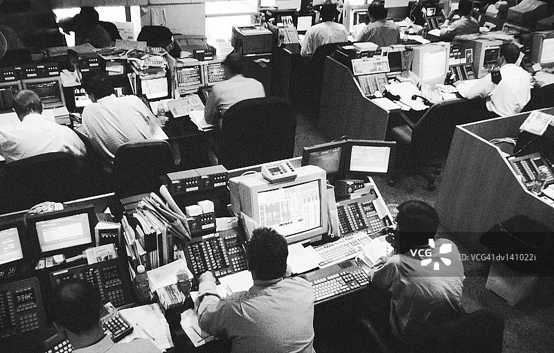 股票经纪人在证券交易所工作图片素材