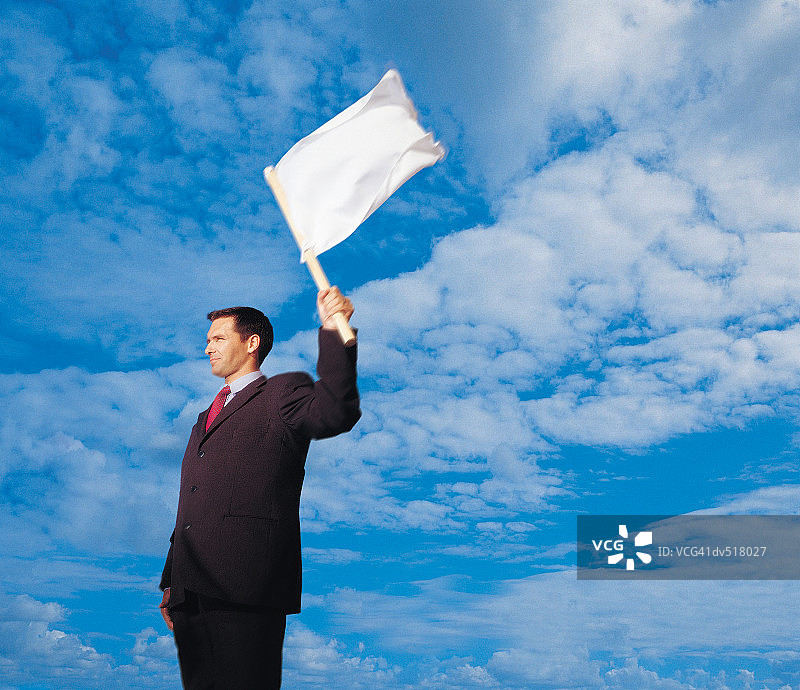 商人手持白旗图片素材
