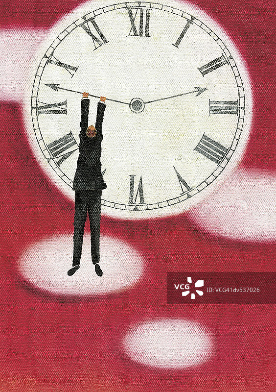 商人悬挂在时钟上图片素材