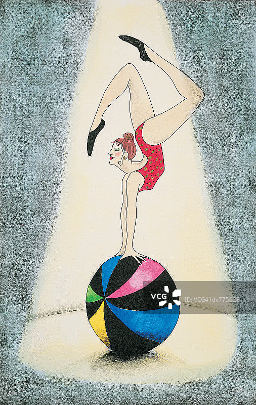 平衡球上的杂技演员图片素材