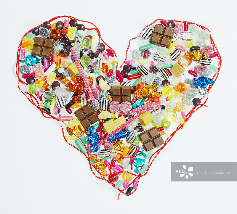 糖果堆成的心形符号特写图片素材