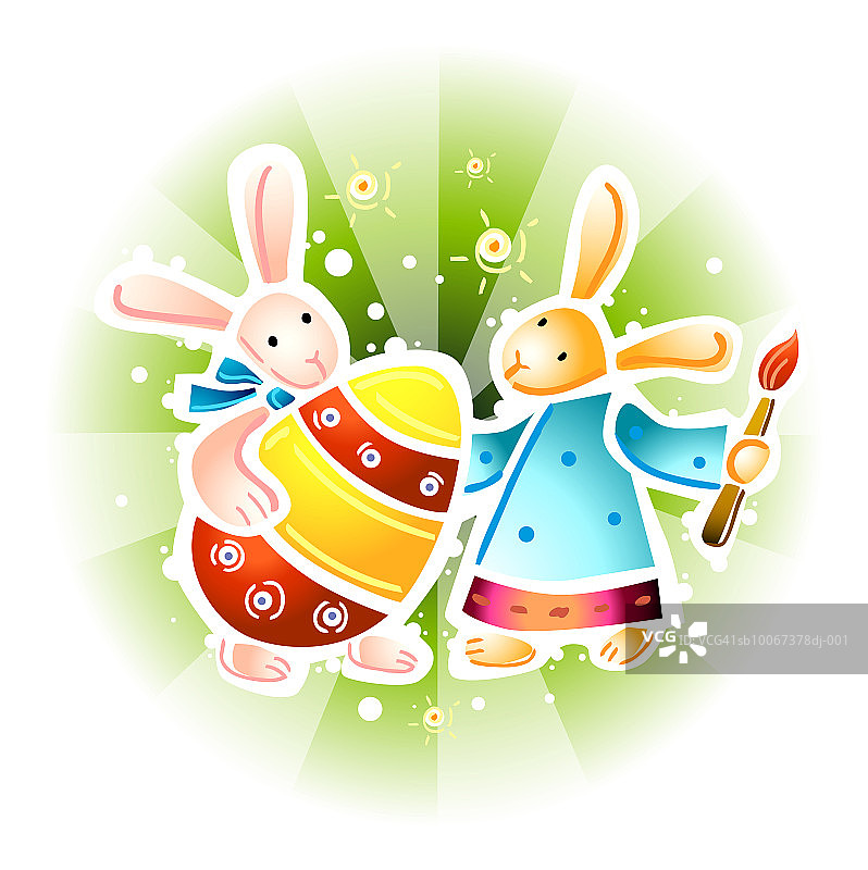 两只带有彩绘蛋的复活节兔子图片素材
