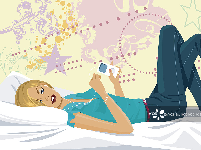 年轻女子在床上听MP3播放器图片素材