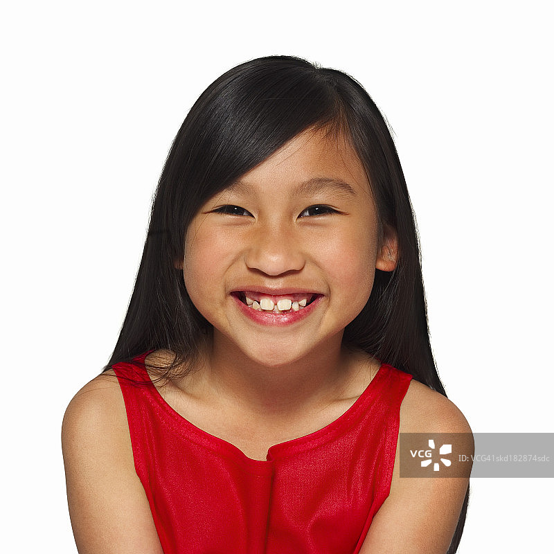 微笑的女孩（10-11岁）正面肖像图片素材