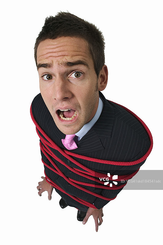 被绳子捆绑的商人肖像图片素材