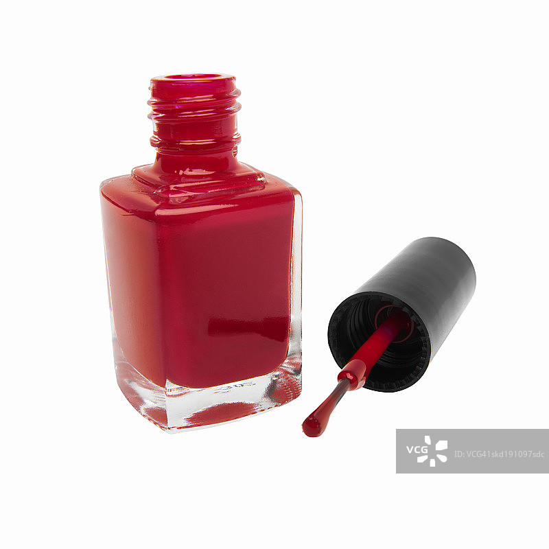 指甲油瓶和指甲刷特写图片素材