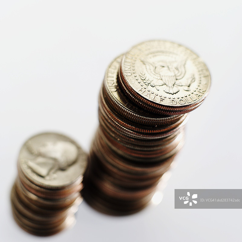 美国25美分和50美分硬币特写图片素材