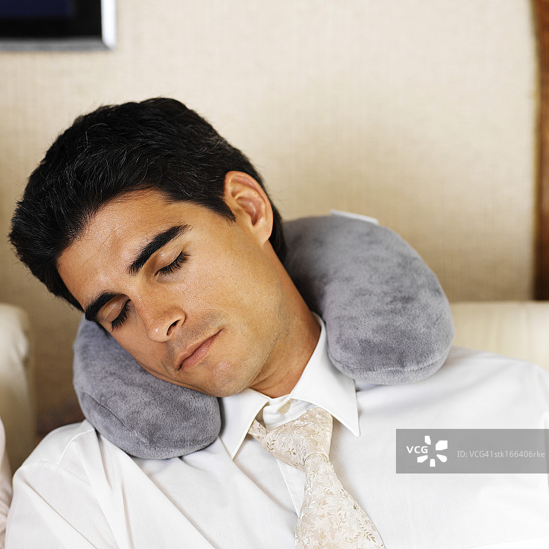 商人在飞机上睡觉图片素材