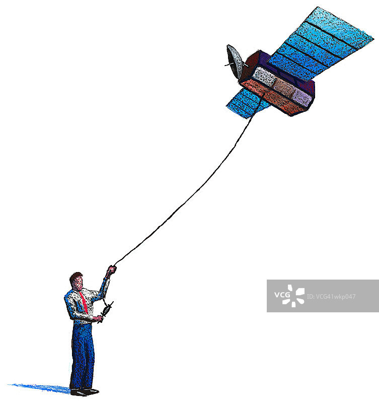 男子放卫星风筝图片素材