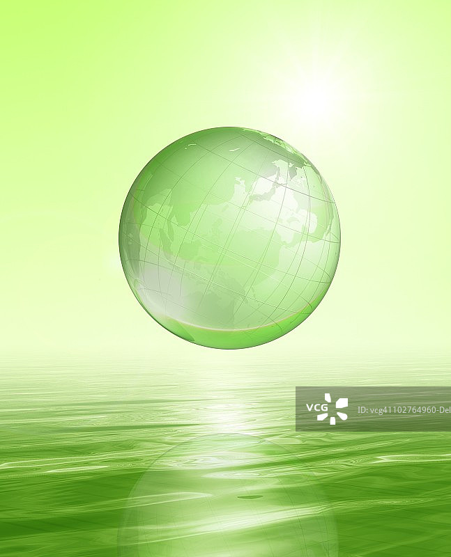 漂浮在水面上的绿色地球图片素材