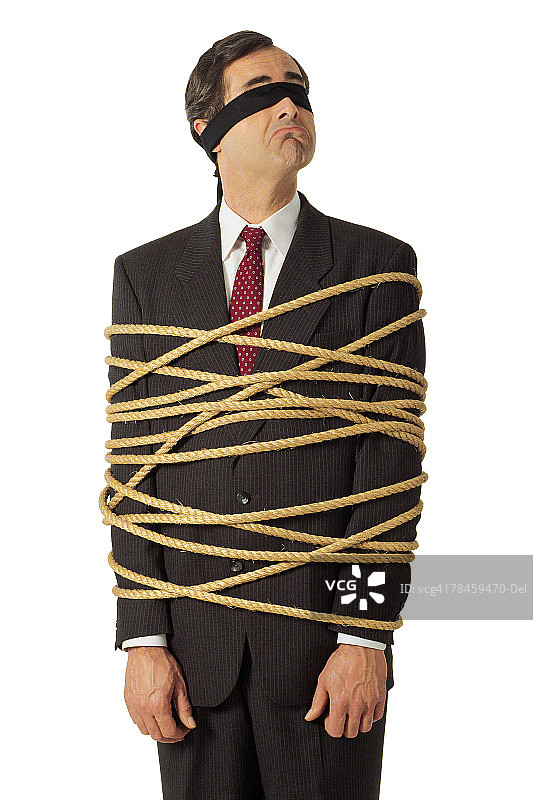被捆绑蒙眼的商人图片素材