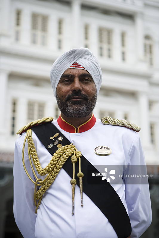 莱佛士酒店外的锡克族门卫图片素材
