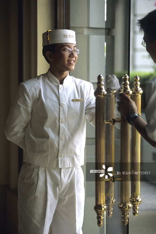 尖沙咀半岛酒店的门卫图片素材