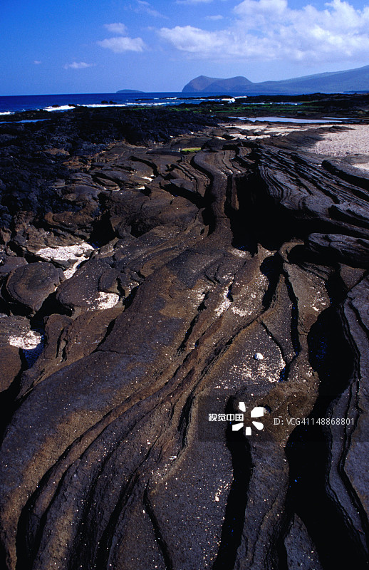 埃加斯港的黑色熔岩海岸线图片素材