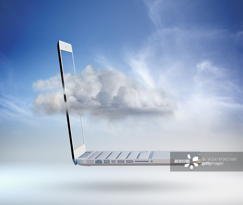 穿梭于笔记本电脑中的云朵图片素材