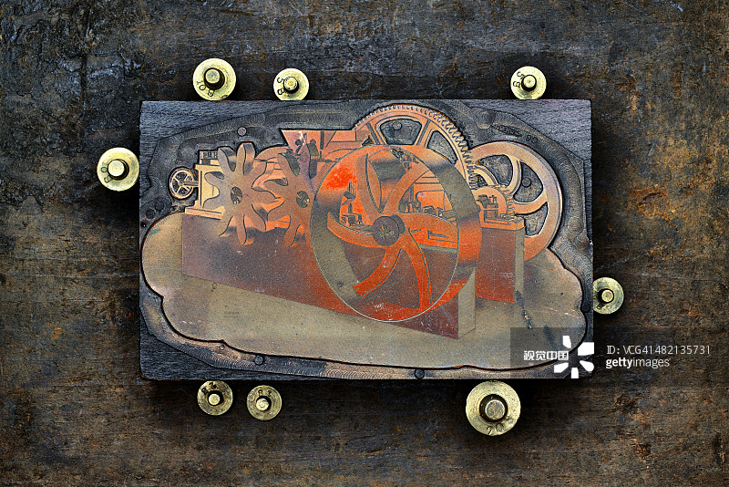 紧的字母压木块和金砝码图片素材