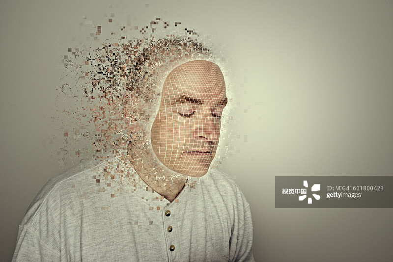 白人男子戴着数码面具图片素材